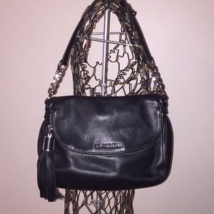 Black leather handbag/silver chain & accents.